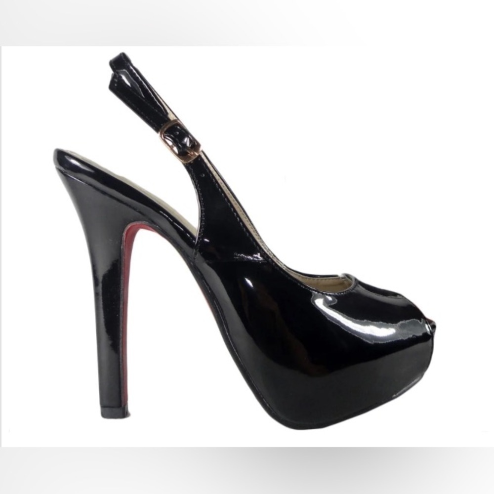 Black pins ladies' shoes with a belt on the heel. Note: No box